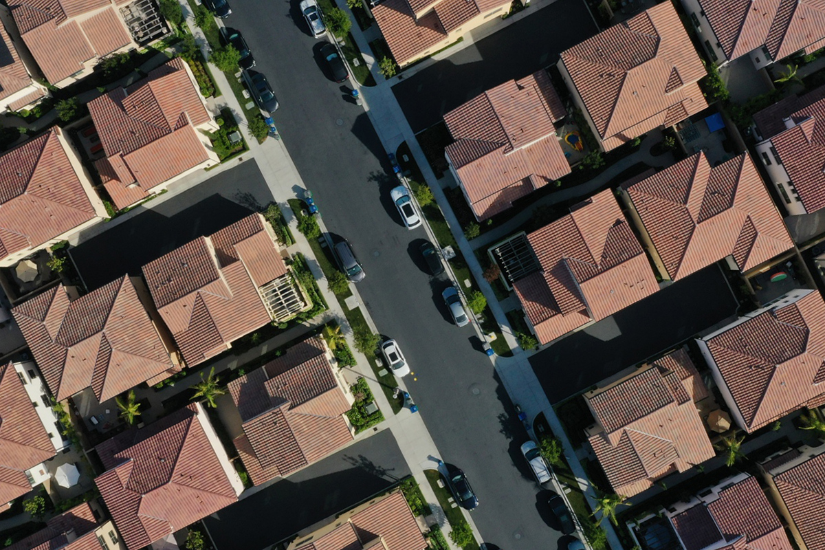 Homes stand in a planned residential community in this aerial photograph taken over Irvine, California.