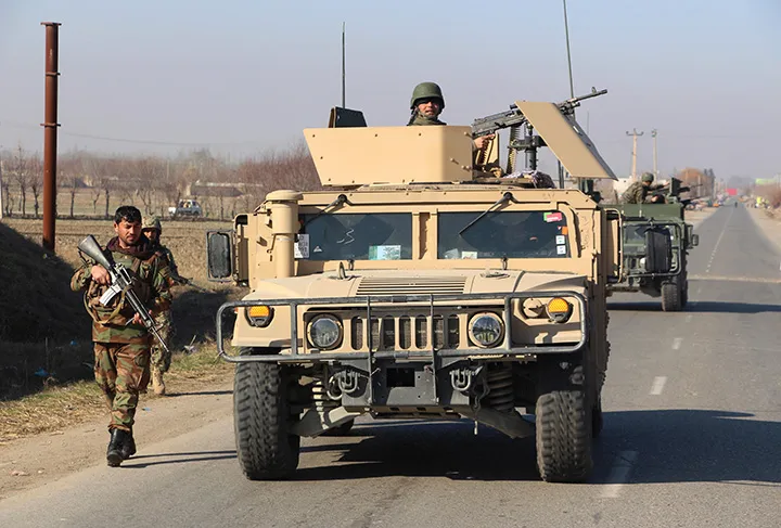Afghan army soldiers take part in a military operation against Taliban militants in Kunduz Province, Afghanistan, on Dec. 25.