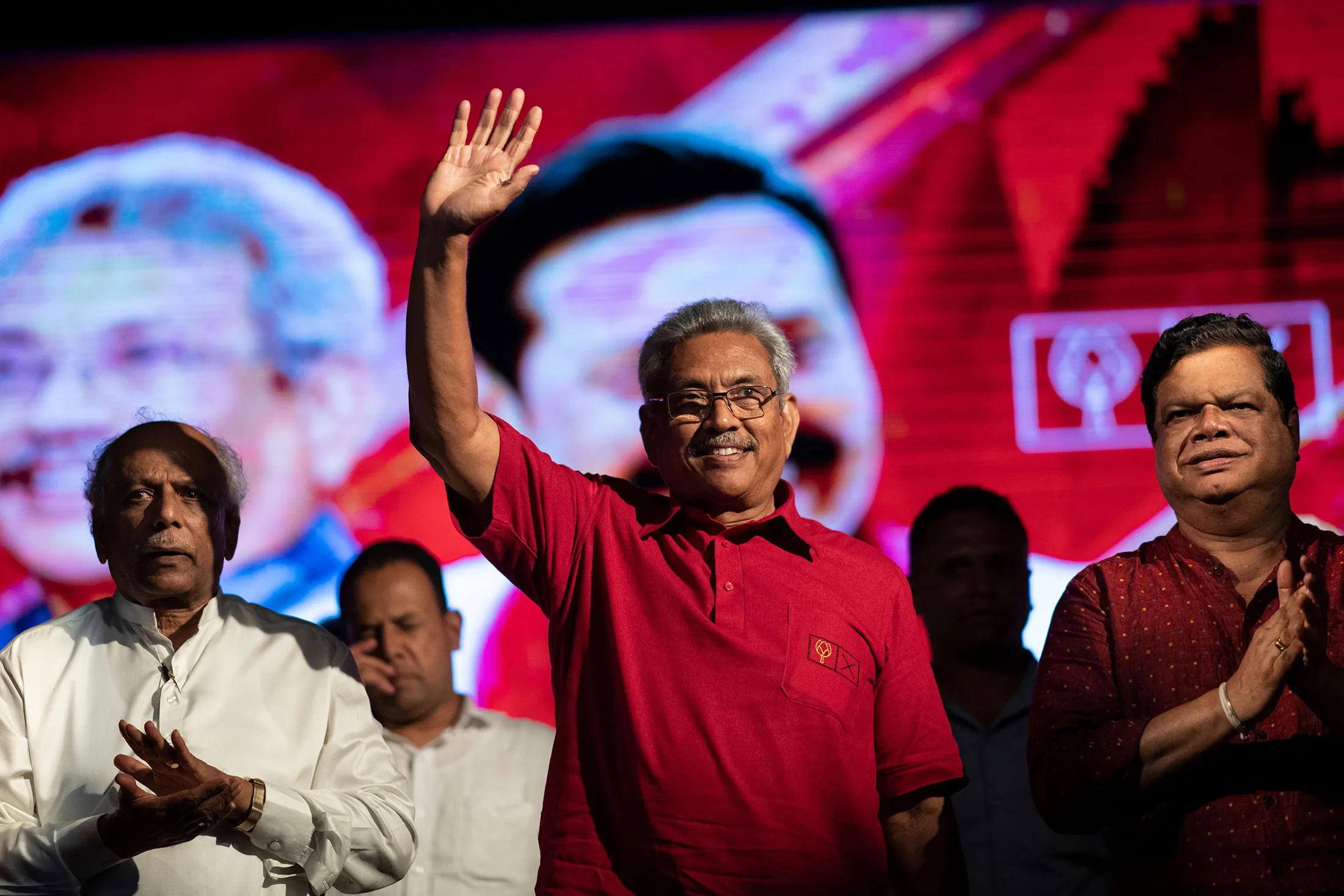 Gotabhaya Rajapaksa waves during a campaign rally in Homagama on Nov. 13.