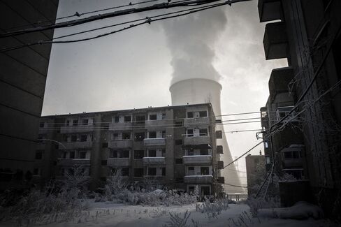 Abandoned apartment buildings next to the plant.