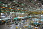Employees assemble Boeing 777 airplanes at the company's facility in Everett, Washington