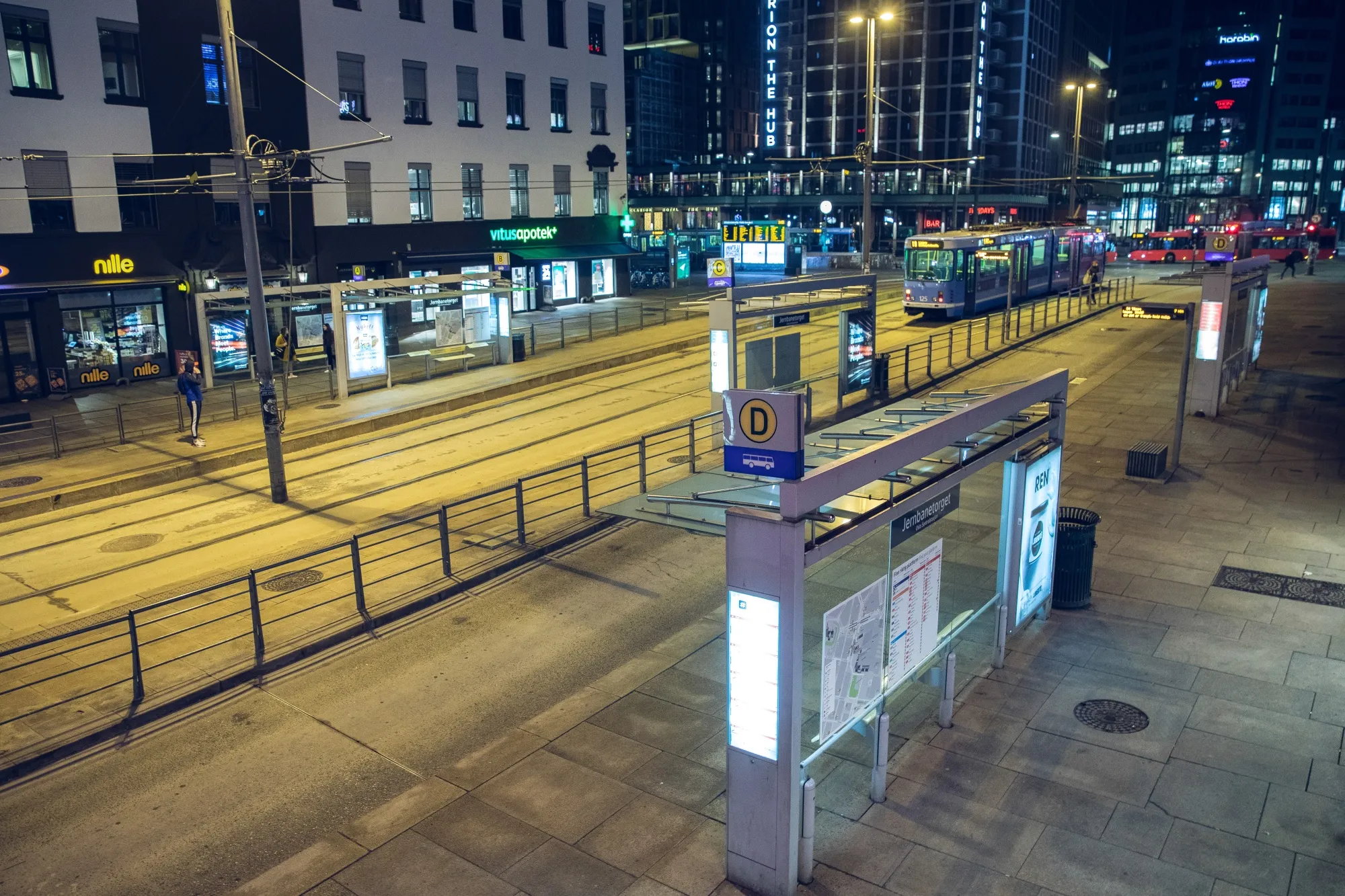 An empty bus stop stands outside Oslo Central station in Oslo, Norway, on Wednesday, March 25, 2020. Norway will extend drastic measures imposed to limit the spread of coronavirus for three weeks, as the number of confirmed cases continues to rise and the richest Nordic economy keeps slowing down.