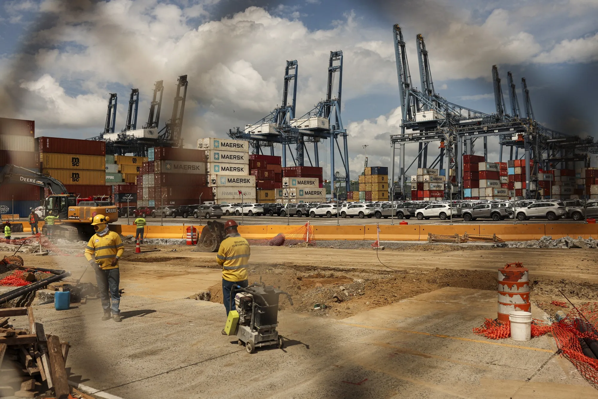 People work on a construction project at the Port of Balboa, managed by CK Hutchison Holdings, at the entrance to the Panama Canal in Panama City on Feb. 23.&nbsp;