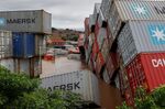 Containers that fell over at a storage facility following heavy rains and winds in Durban, on April 12.
