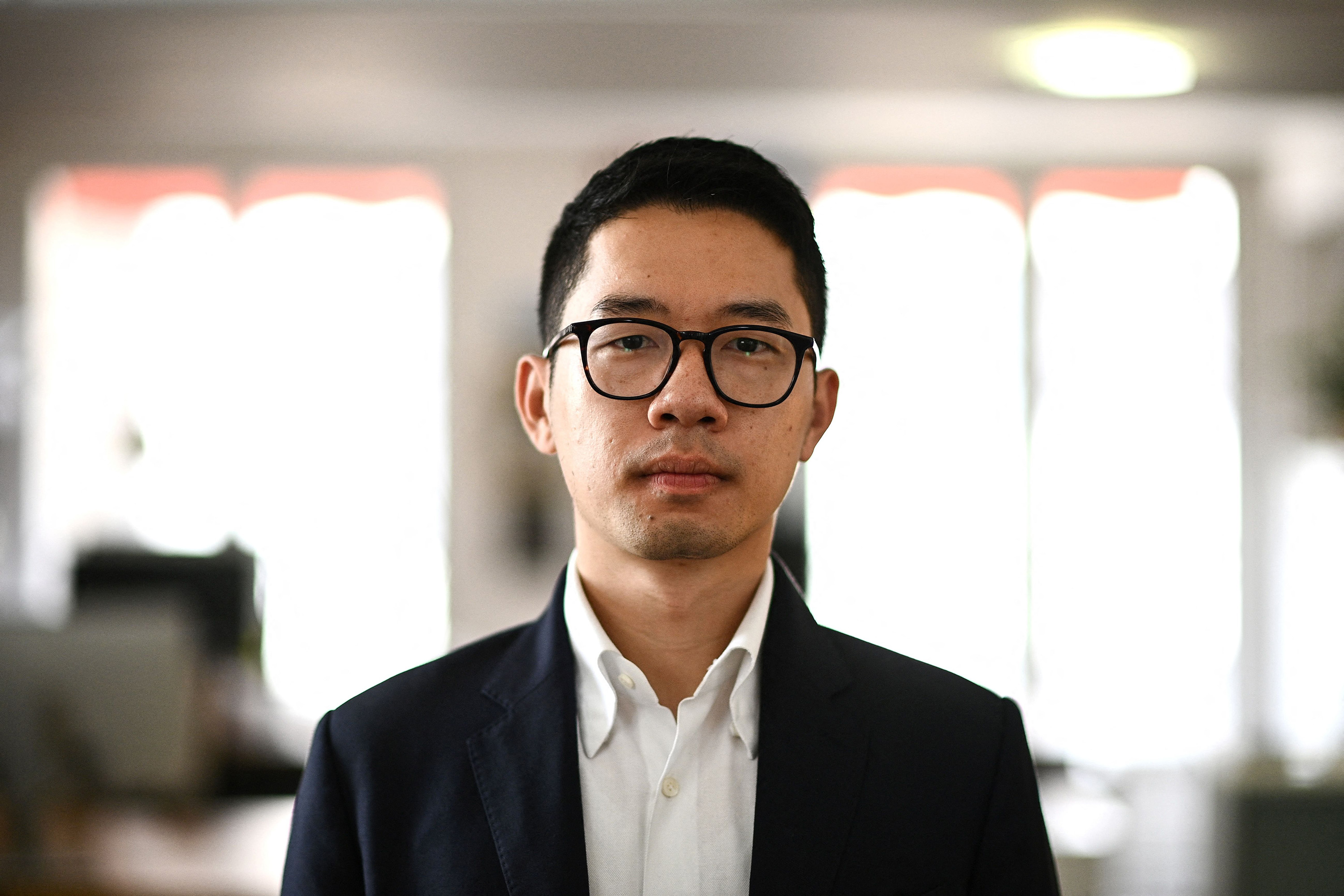 Hong Kong Activist’s Family Quizzed by Police, Local Media Say Bloomberg