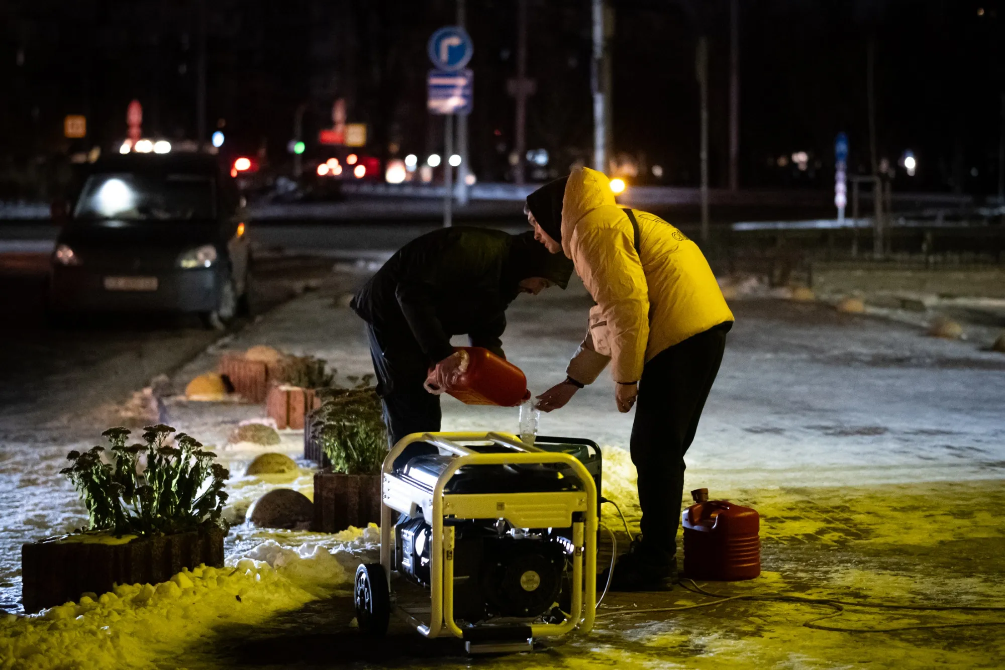 Restaurant workers refuel a generator during a power outage following Russian attacks,&nbsp;in Kyiv, on Dec. 30.