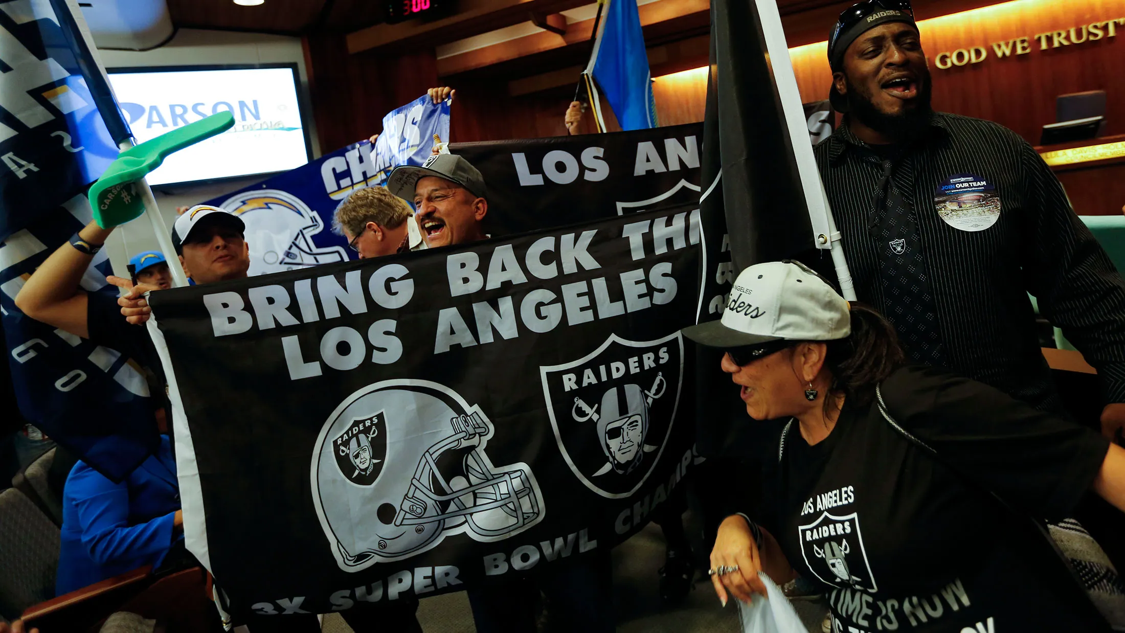 Raider and Chargers fans gathered for a 'tail gate' party and rally before marching to Carson City Hall to support the building of a stadium that would house the two NFL franchises, on April 21, 2015.
