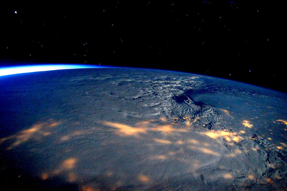 A winter storm affecting the U.S. East Coast is seen in a NASA picture taken from the International Space Station January 23, 2016. The storm dumped nearly 2 feet (58 cm) of snow on the suburbs of Washington, D.C., on Saturday before moving on to Philadelphia and New York, paralyzing road, rail and airline travel along the U.S. East Coast. 