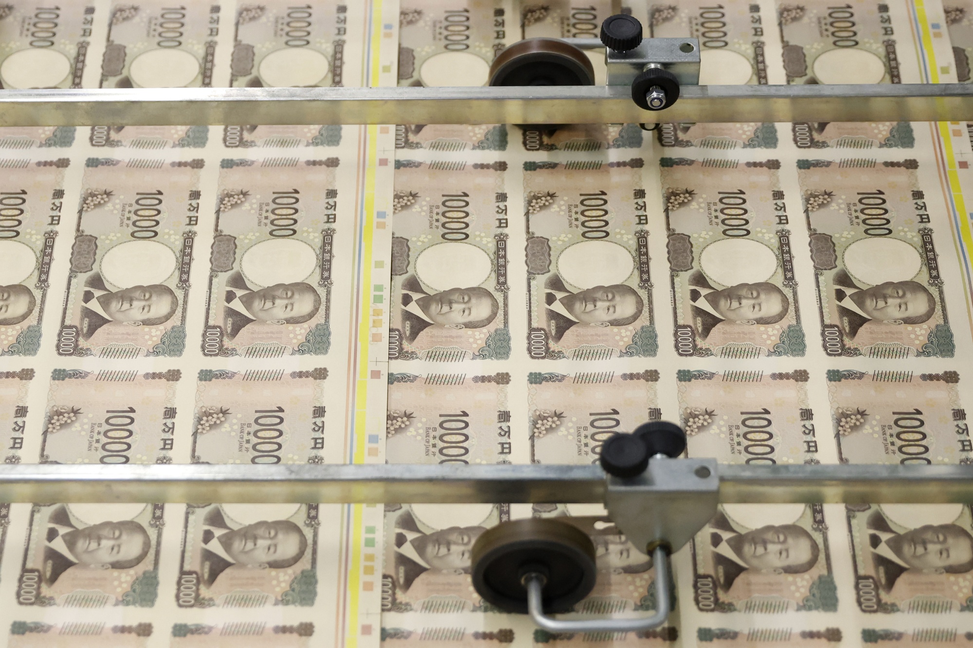 Sheets of newly-designed Japanese 10,000 yen banknotes.