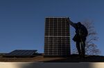 A contractor installs&nbsp;solar panels on a roof in San Jose, California.
