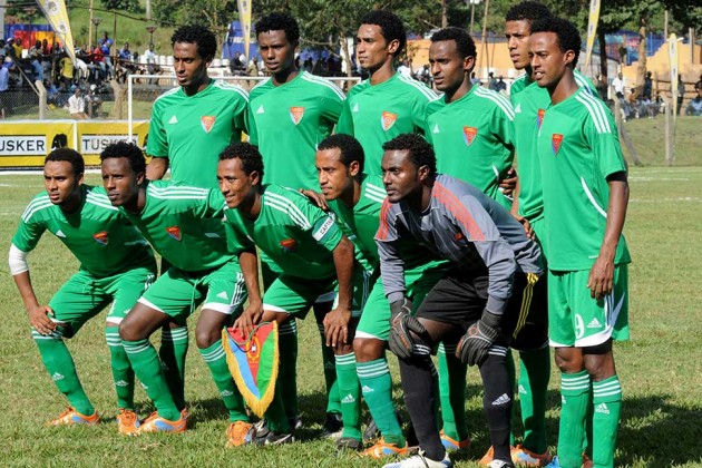 Eritrean national football team players pose on Dec. 1, 2012 before a match against the Rwandan national team at the Namboole International Stadium in Kampala