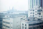 Buildings shrouded in smog in Hong Kong, China