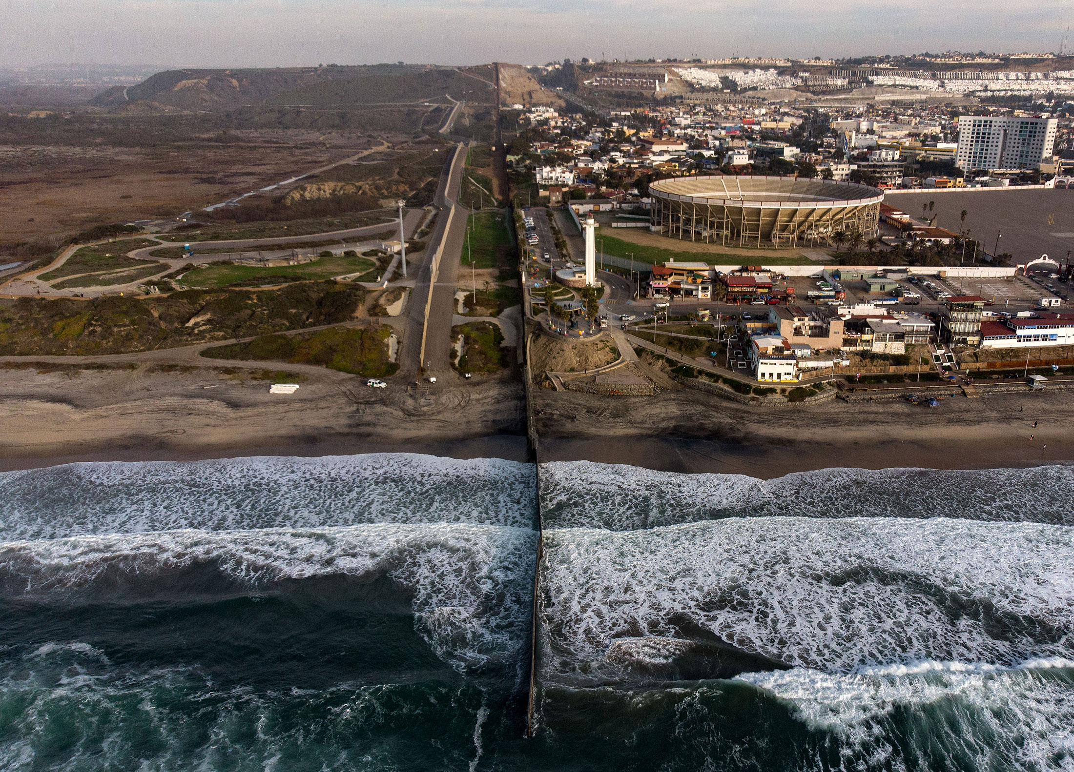 Aerial view of the US-Mexico border fence seen from Playas de Tijuana, Baja California state.&nbsp;