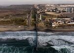 Aerial view of the US-Mexico border fence seen from Playas de Tijuana, Baja California state. 