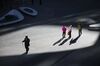 Pedestrians walk through the atrium of Soho China Ltd.'s Galaxy Soho complex in Beijing, China, on Wednesday, Dec. 2, 2015. China's great rebalancing -- the long-sought shift away from investment and manufacturing towards consumption and services -- is one of the nation's big themes of the year. One problem: the rebalancing stops at the water's edge.