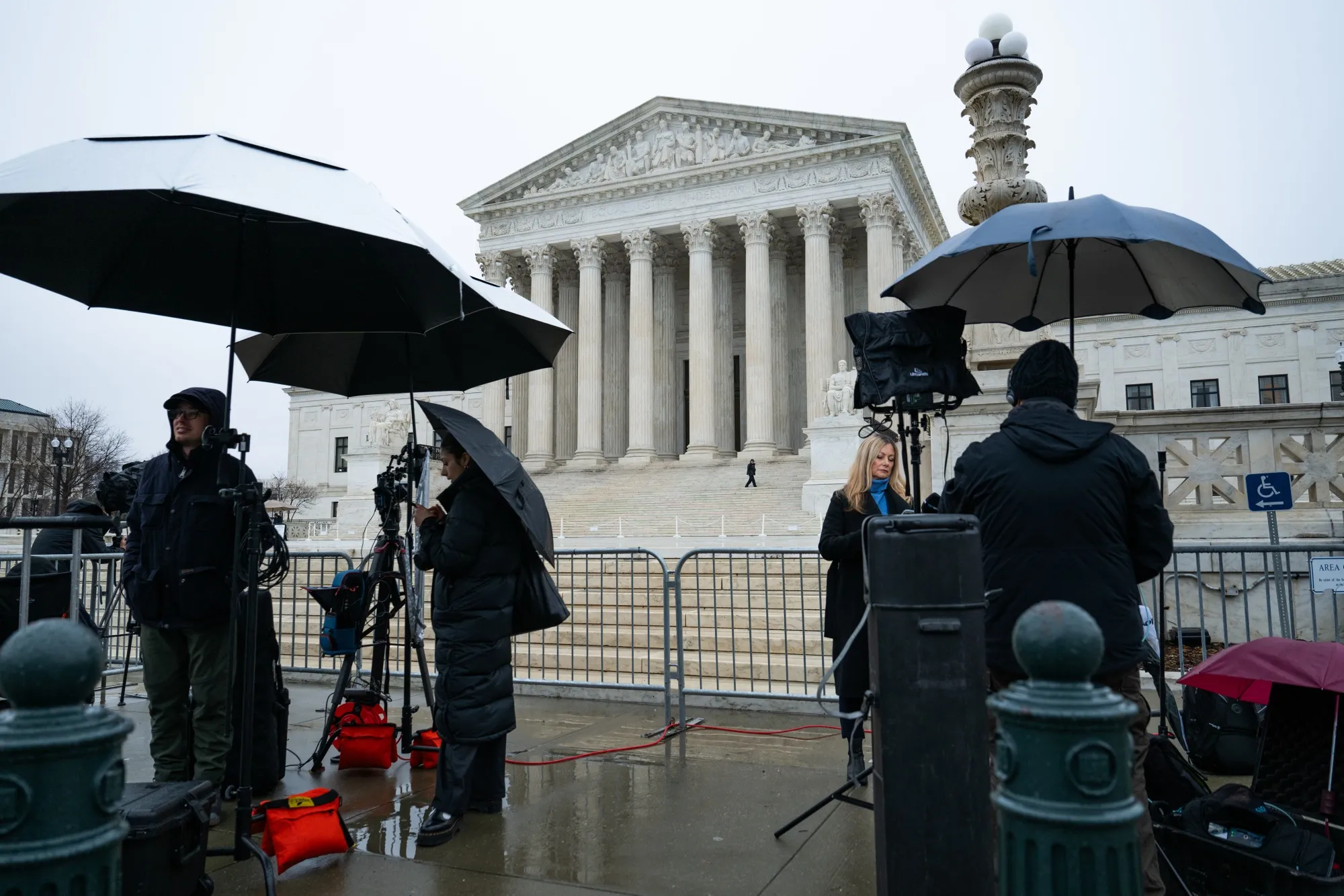 TV crews set up cameras in front of the US Supreme Court in Washington, DC,&nbsp;on&nbsp;Feb. 20.