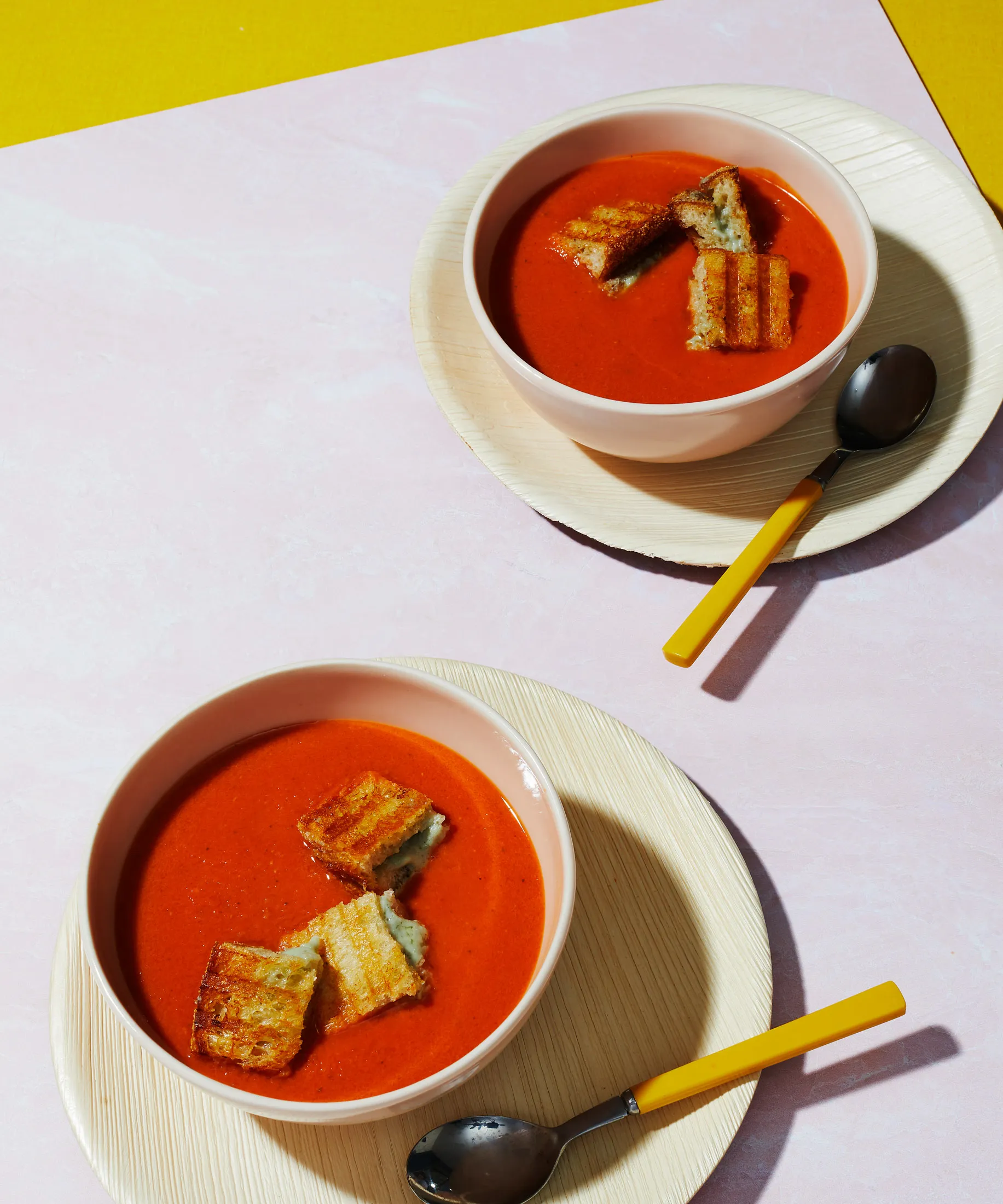 Comforting tomato soup with nifty grilled cheese croutons.