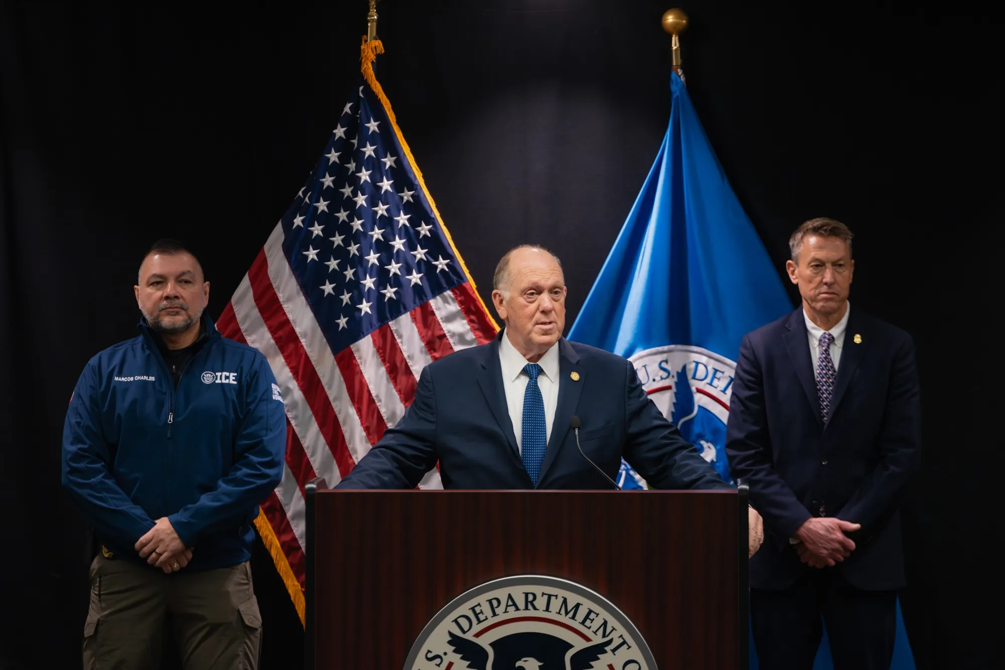 White House border czar Tom Homan, center, said he’s working on a “draw down plan” in Minneapolis.
