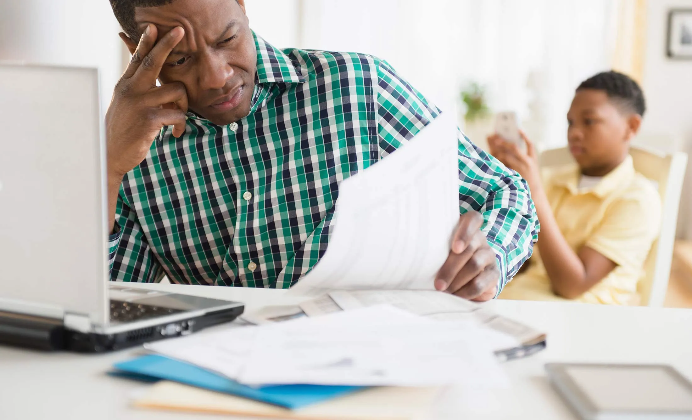 1470950842_parent-money-stress-bills-2