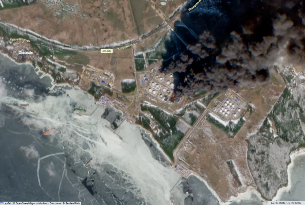 Smoke billows from crude oil storage tanks at Russia's Primorsk oil export terminal on March 24, 2026.