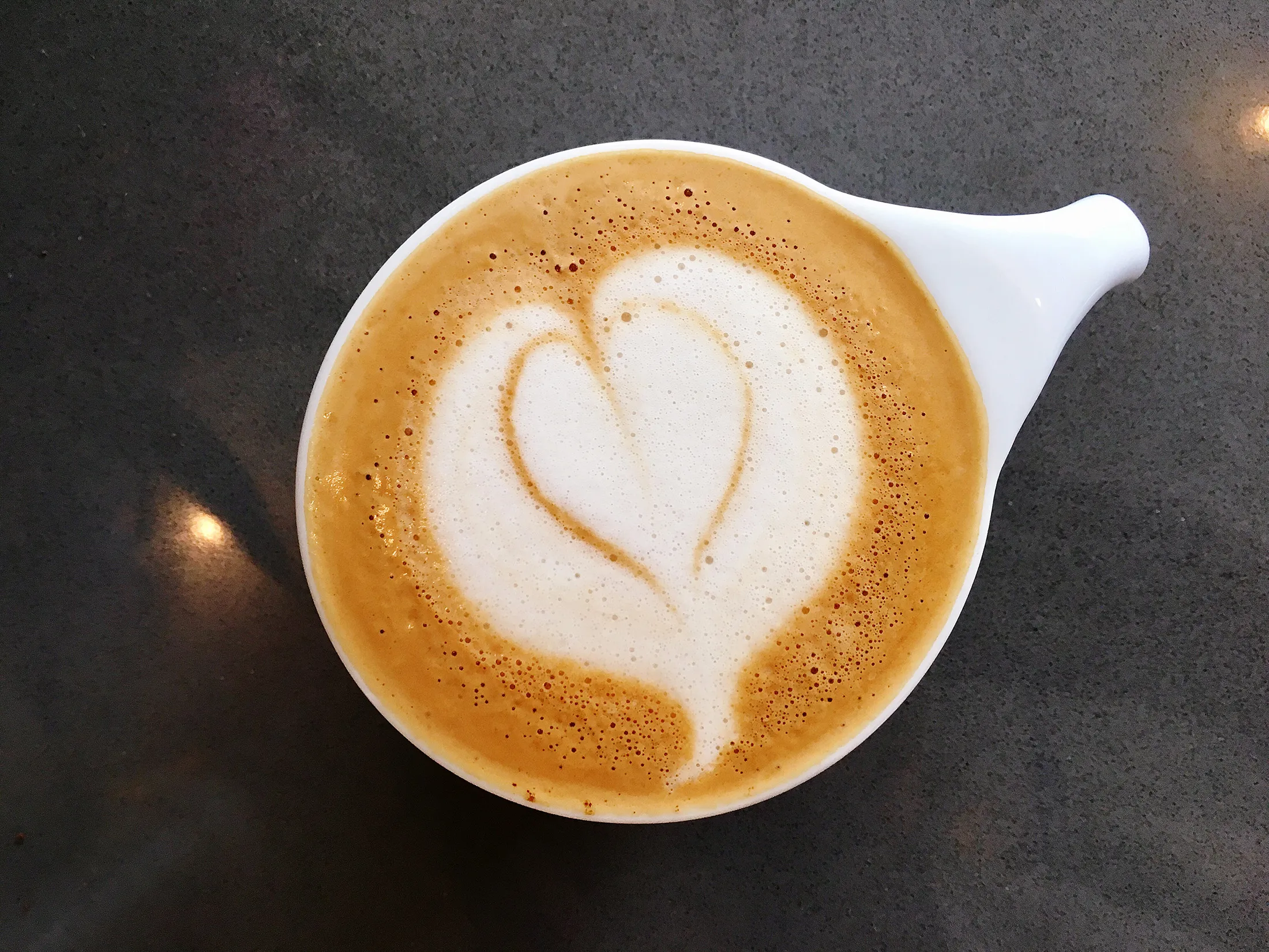 An oat milk cappuccino at an Intelligentsia coffee shop.