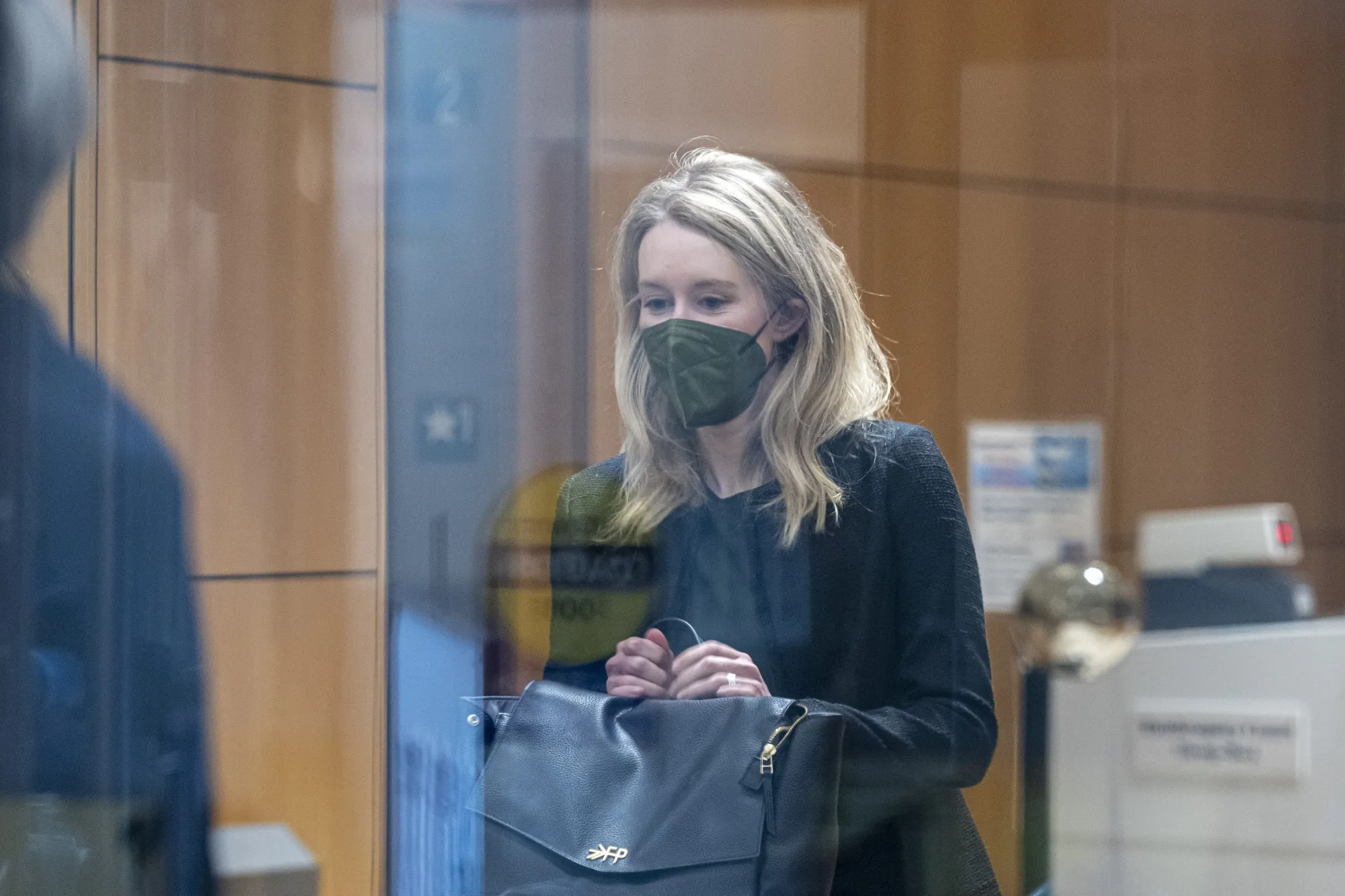 Elizabeth Holmes arrives at federal court in San Jose, on Oct. 12.