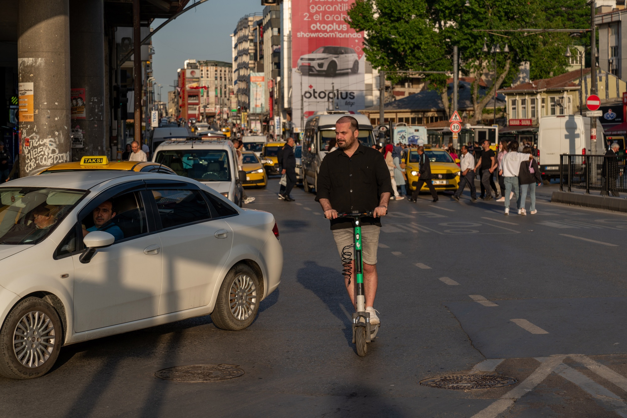 Ordinary life in the old district of Istanbul. two guys are riding along a  narrow street on one electric scooter. Turkey , Istanbul - 21.07.2020 Stock  Photo - Alamy