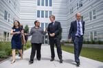 HUD Secretary Marcia Fudge (second from left) tours an affordable apartment complex in Alexandria, Virginia, in August 2021.&nbsp;