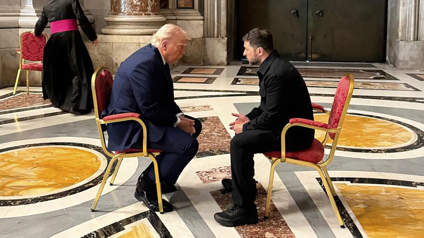 US President Donald Trump and Ukraine’s Volodymyr Zelenskiy talk before the funeral of Pope Francis in Vatican City on April 26.
