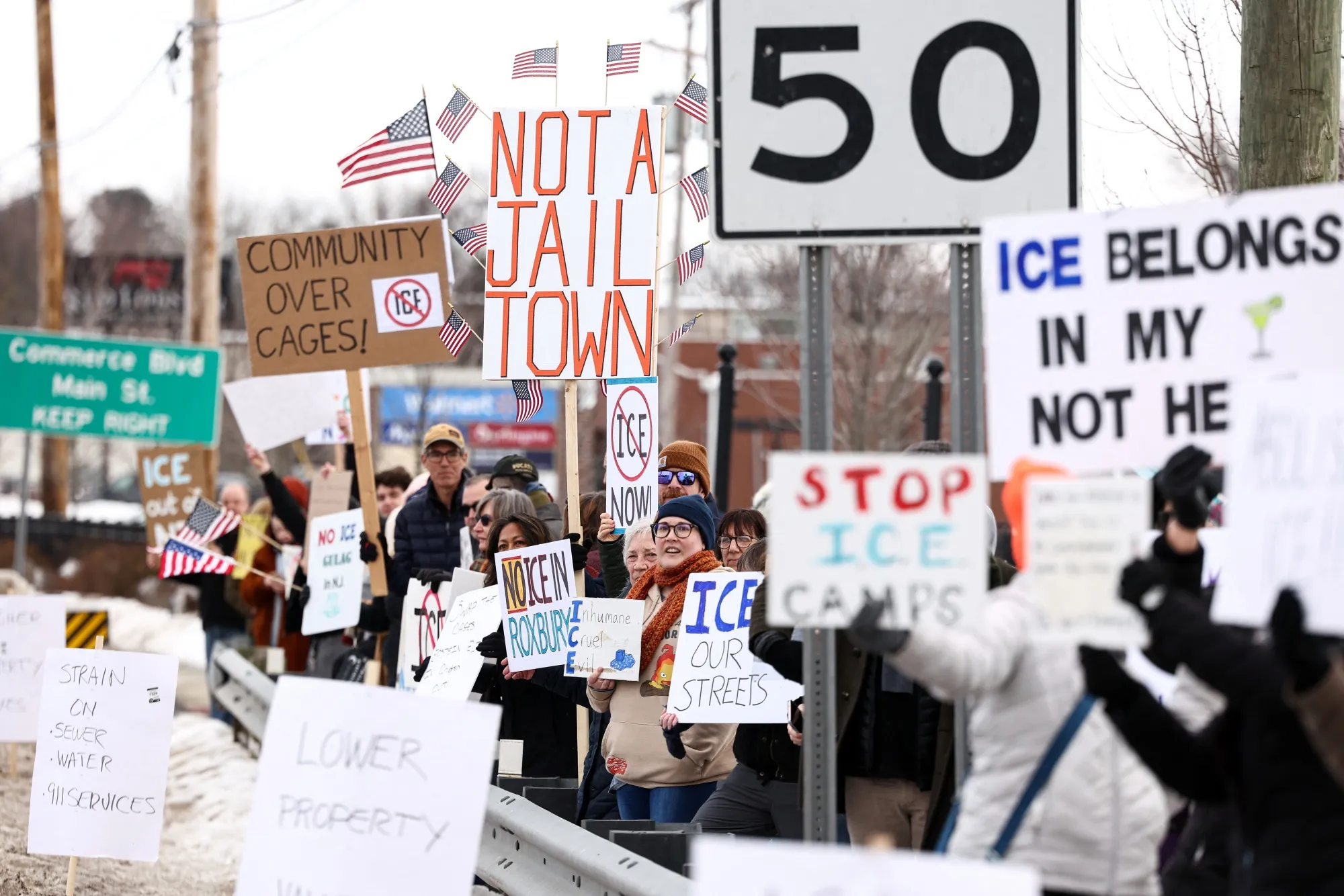People protest against a plan to convert a warehouse into an immigration detention center in Roxbury, New Jersey, on Feb. 16.