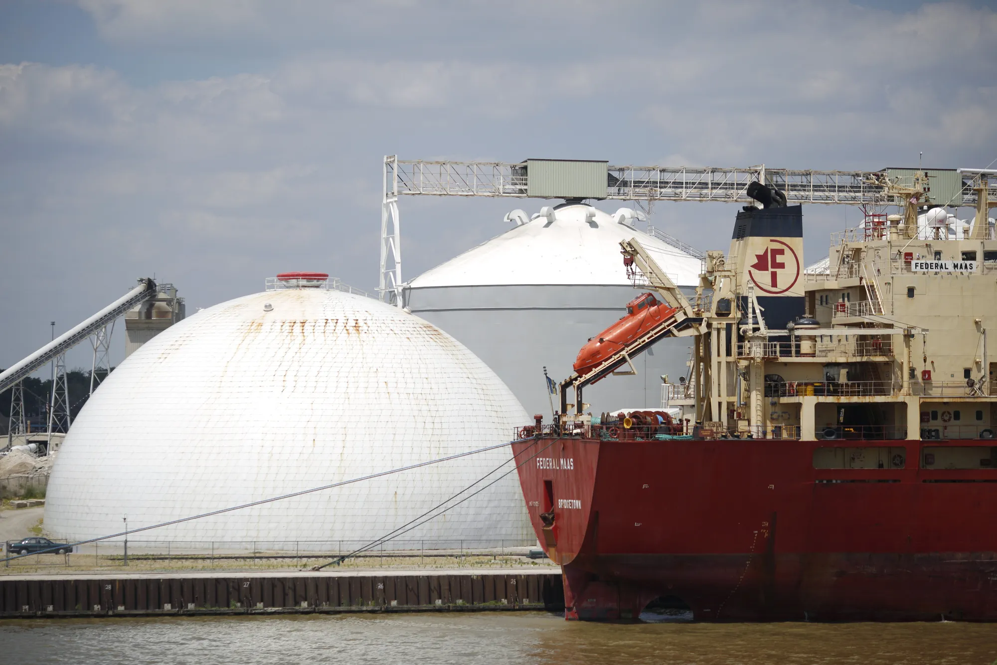 Soybeans are loaded onto the Federal Maas bulk carrier ship moored at the Andersons Inc. grain trans-loading facility in Toledo, Ohio.