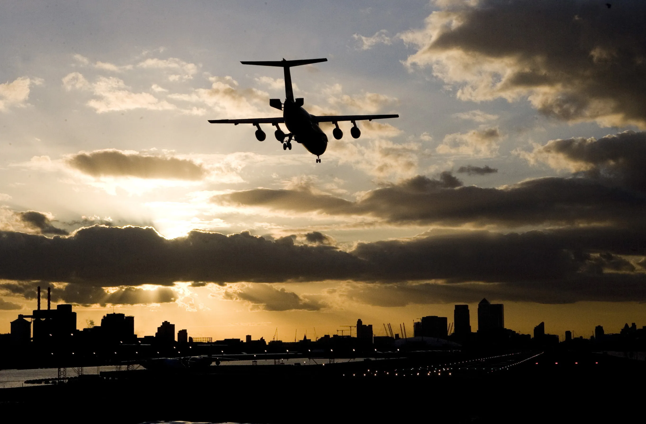 An airplane lands in the UK