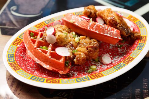 If you're in the mood for fried chicken, it's served here with a red velvet waffle. If you don't want powdered sugar on top, let the kitchen know.