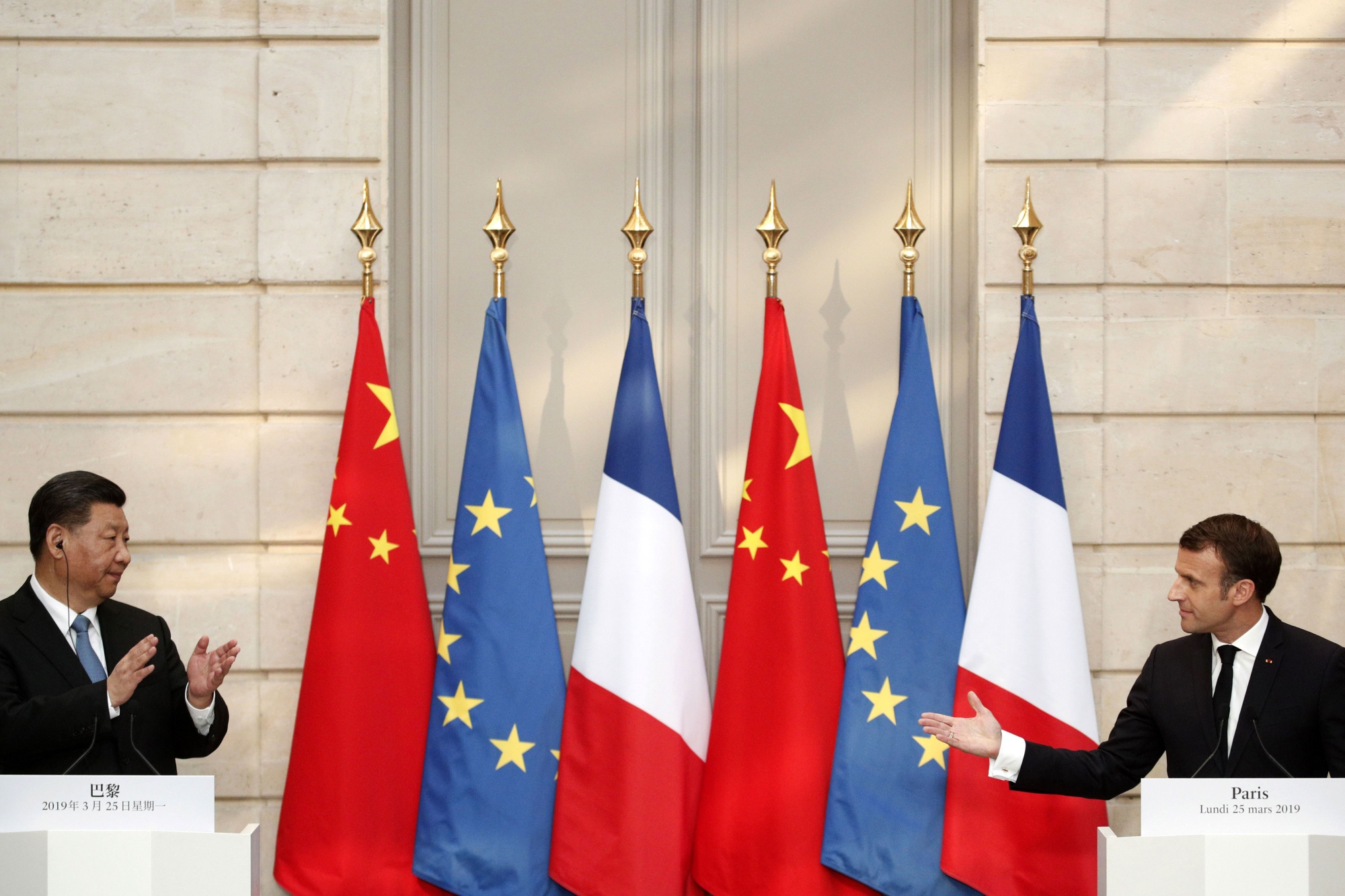 Emmanuel Macron&nbsp;and Xi Jinping during a news conference in Paris, on March 25.