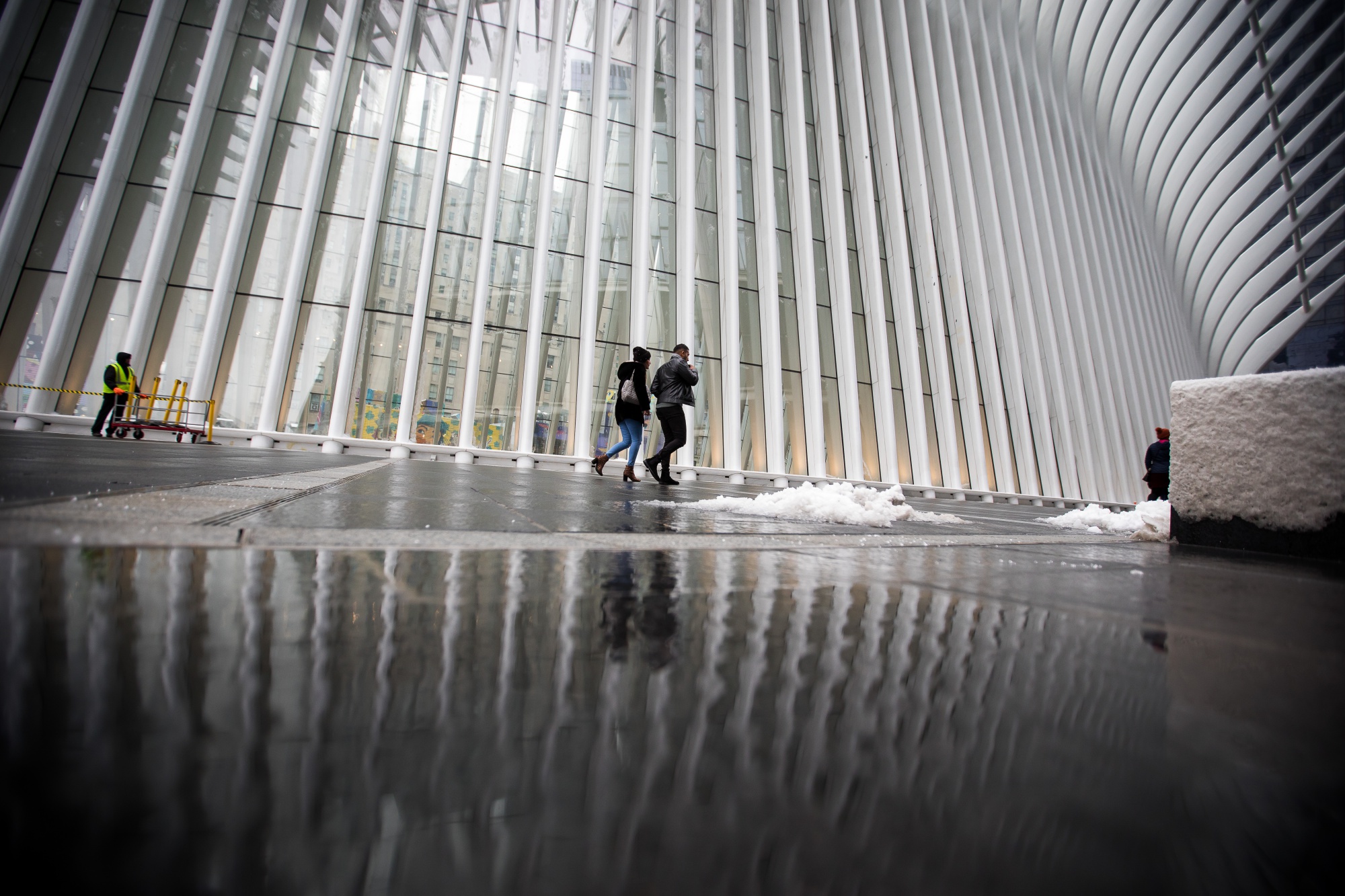 Pedestrians pass in front of the Oculus transportation hub in New York.