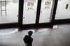 A security guard stands inside the Tokyo Stock Exchange (TSE), operated by Japan Exchange Group Inc. (JPX), in Tokyo, Japan, on Friday, April 26, 2019. Japan's retail investors have propelled their net long yen positions against the dollar to near a record ahead of the nation's extended Golden Week holidays.