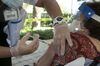 A resident receives a dose of Pfizer-BioNTech Covid-19 vaccine in Miami, Dec. 29.