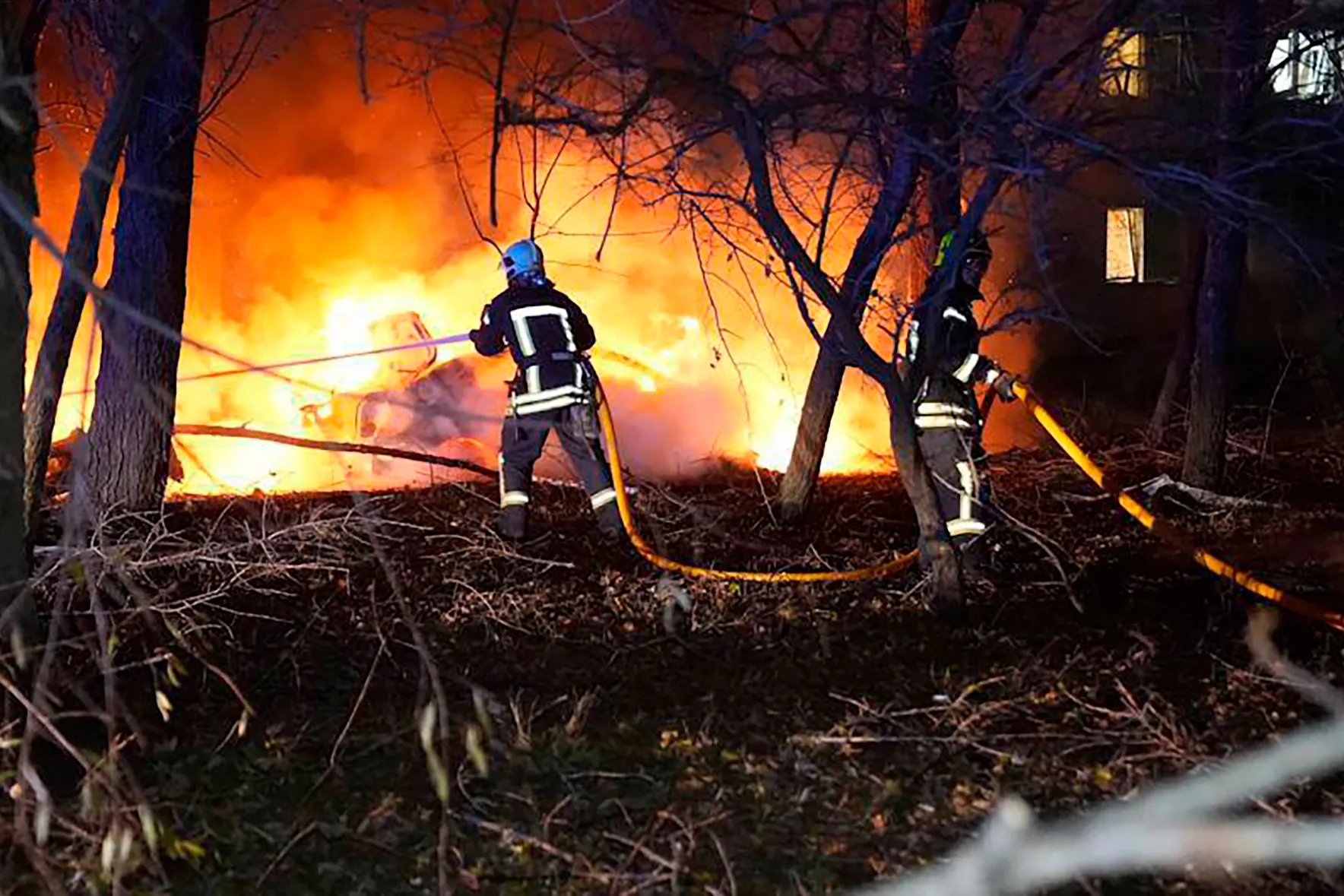 Firefighters attend the scene of a Russian attack in Sumy, Ukraine, on Nov. 17.