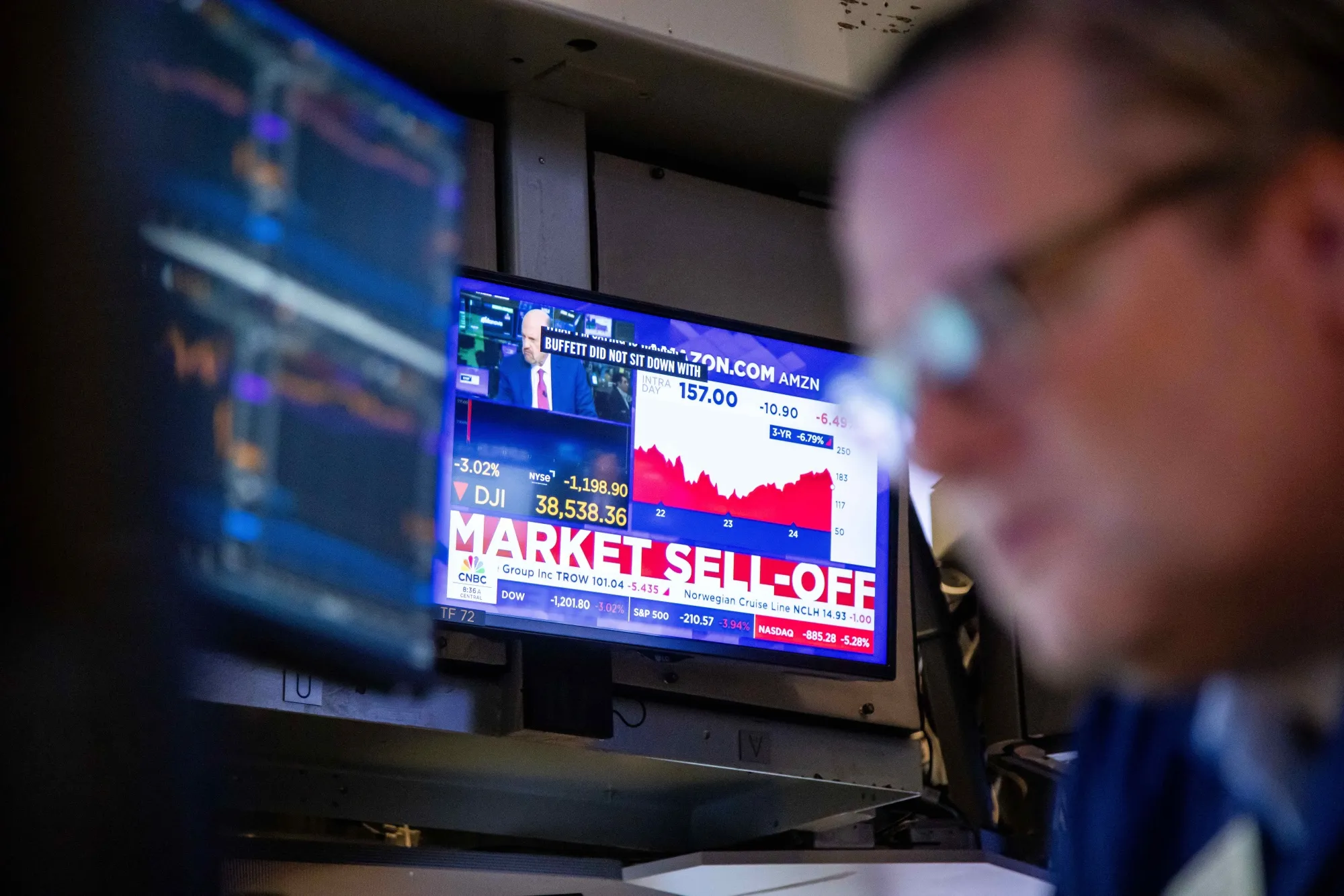 A television displays stock market news on the floor of the New York Stock Exchange on Aug. 5.&nbsp;
