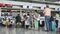 Saigon, Vietnam - January 13, 2015: Passengers waiting at Jetstar Pacific Air check in counters at Tan Son Nhat International Airport, Saigon, Vietnam. Jetstar is a lowcost airline in Vietnam.