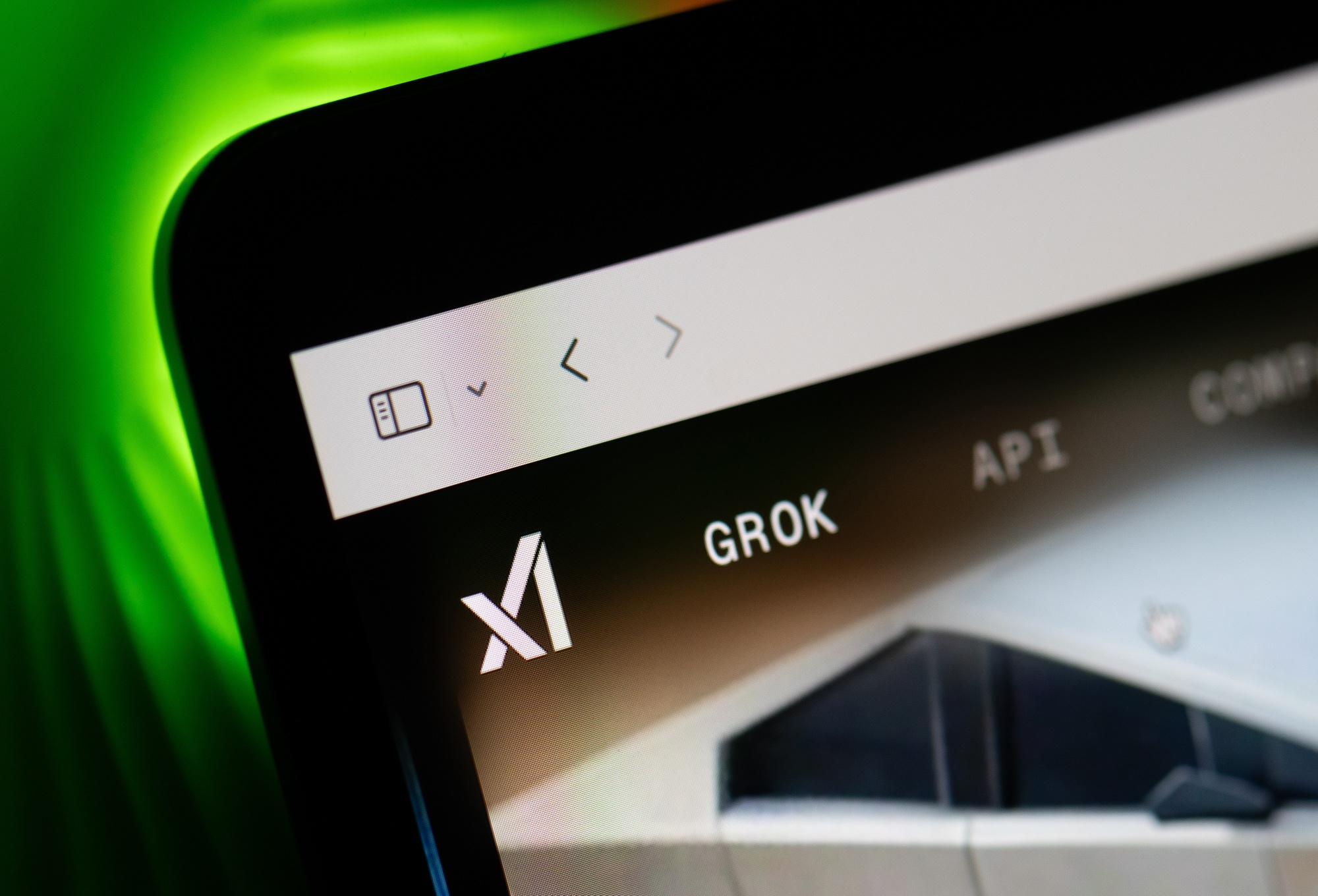 The logos of xAI and Grok on a smartphone arranged in Riga, Latvia, on Monday, June 9, 2025. Announced in March, XAI Holdings was created from the combination of X, formerly Twitter, and Musk’s AI venture, xAI. Photographer: Andrey Rudakov/Bloomberg