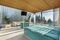 relates to This $12.8 Million Canadian Mansion Is a Waterfall of Steel and Chrome
