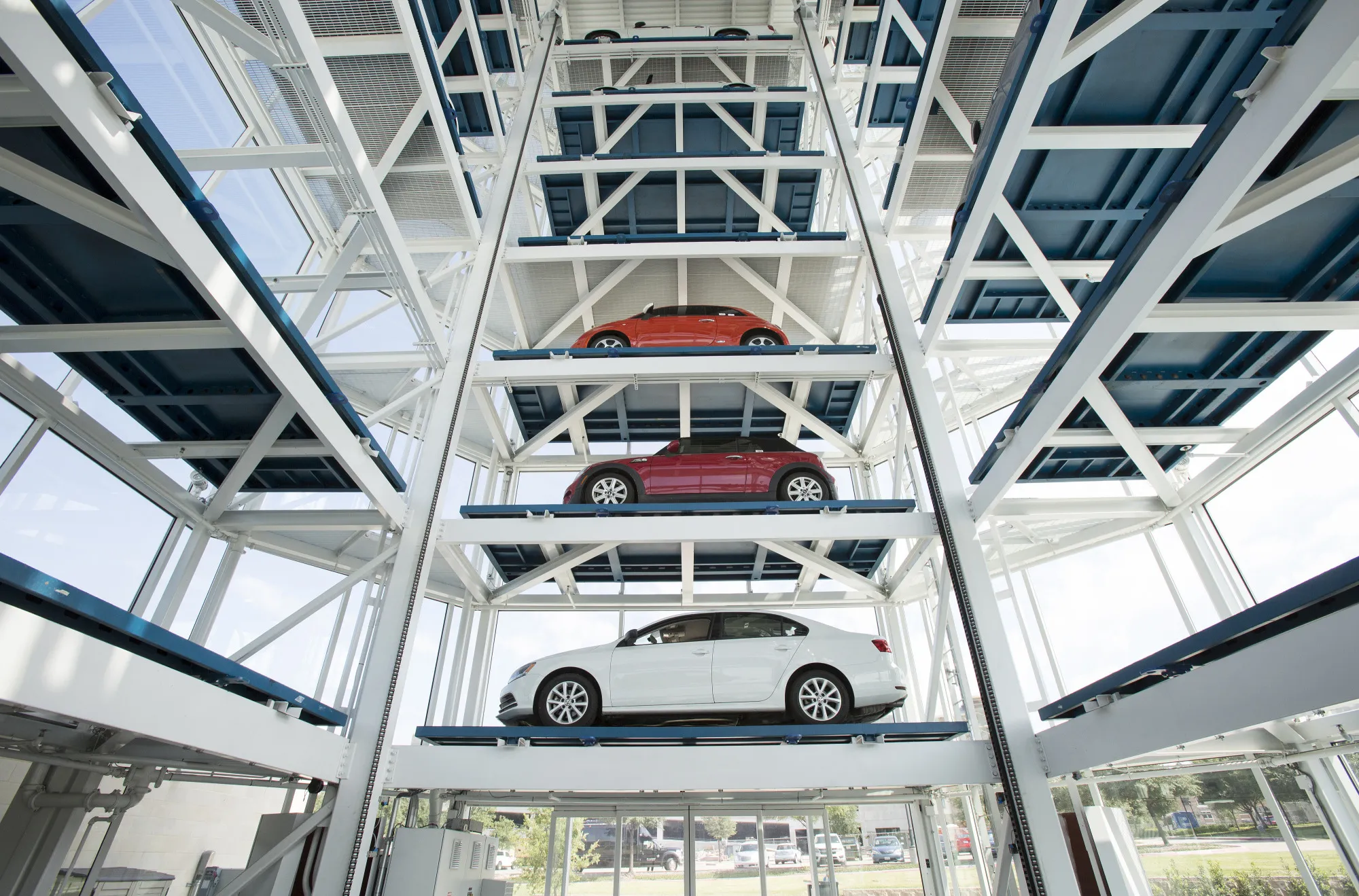 Vehicles sit inside a Carvana Co. car vending machine in Frisco, Texas.&nbsp;