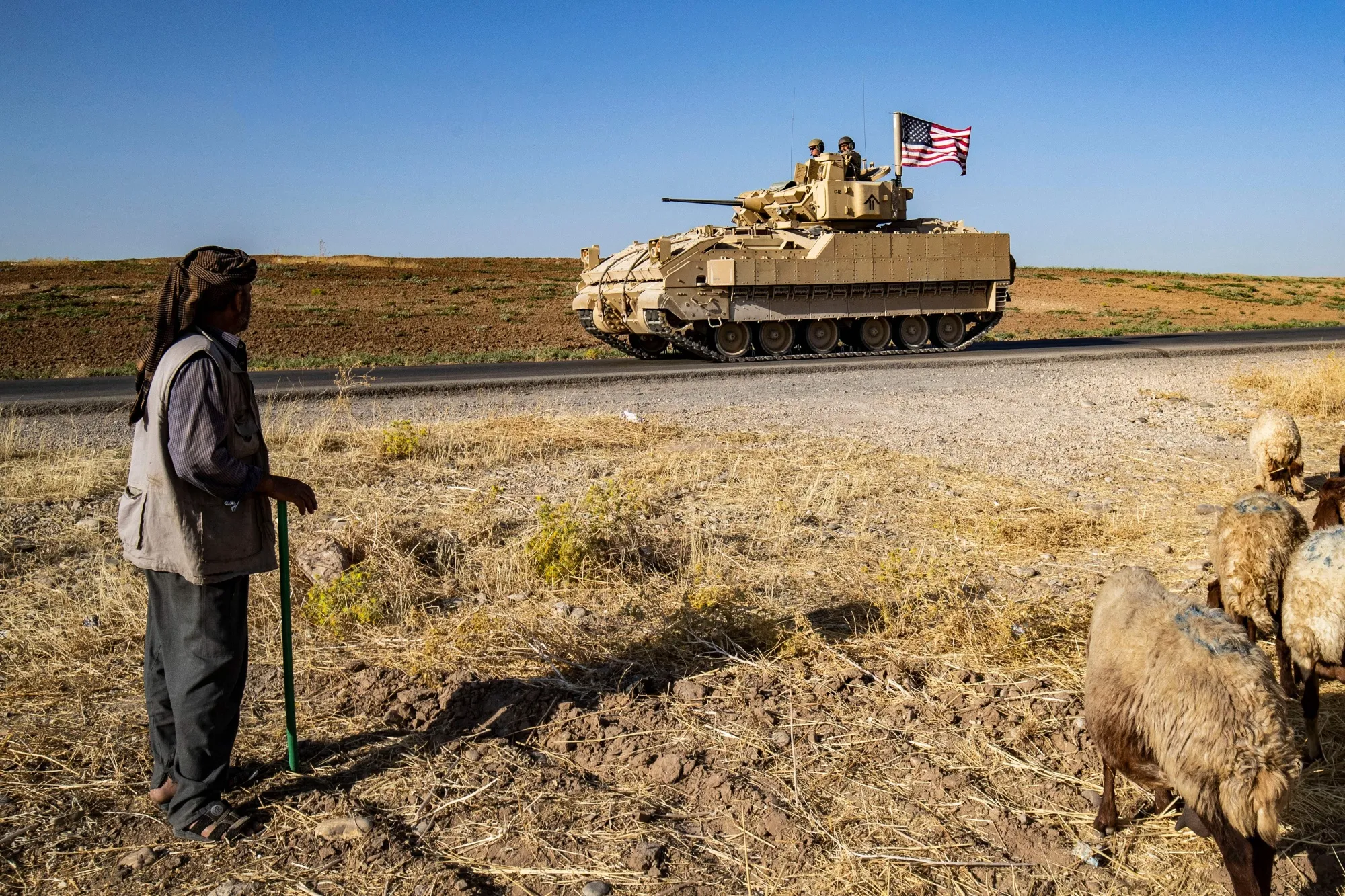 US soldiers patrol the countryside in Syria’s northeastern Hasakeh province in July.