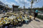 Floral tributes in memory of flood victims, in front of a subway station in Zhengzhou, China, on July 27.
