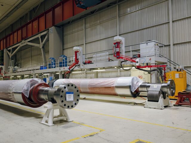 The rotor goes inside the stator. It becomes an electromagnet turning at 3,000 rotations per minute to maintain grid stability.