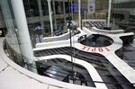 Tokyo Stock Exchange and Stock Boards As Japan Shares Dip With Banks As Volatility Returns to Markets