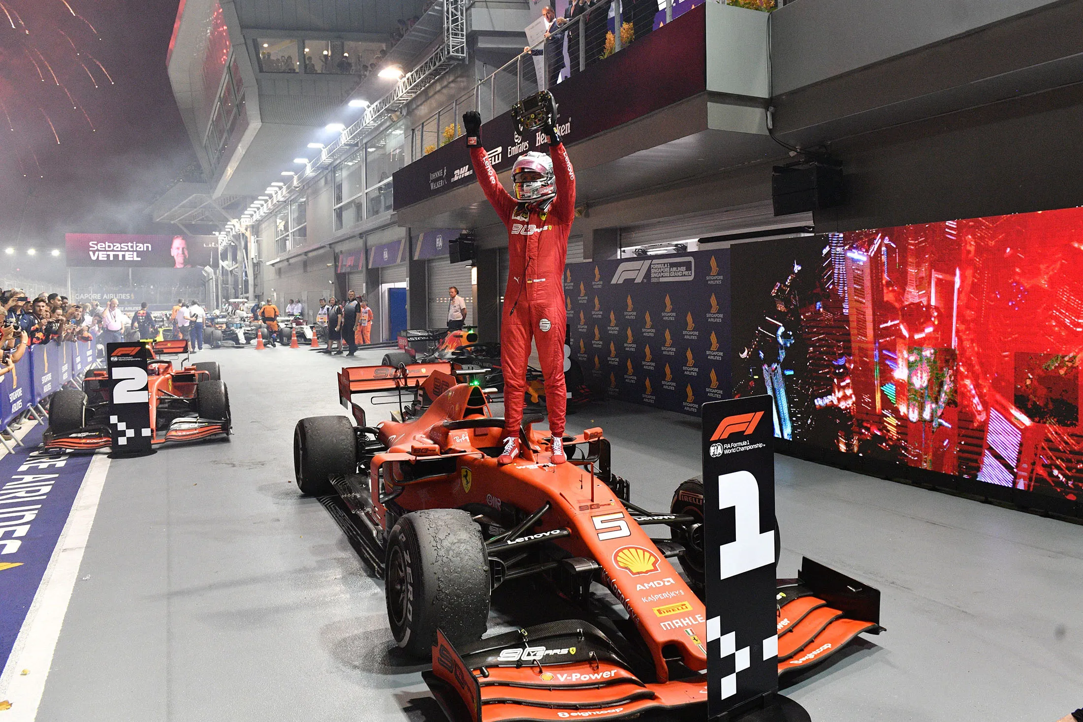 Sebastian Vettel celebrates his victory at the end of the Formula One Singapore Grand Prix.