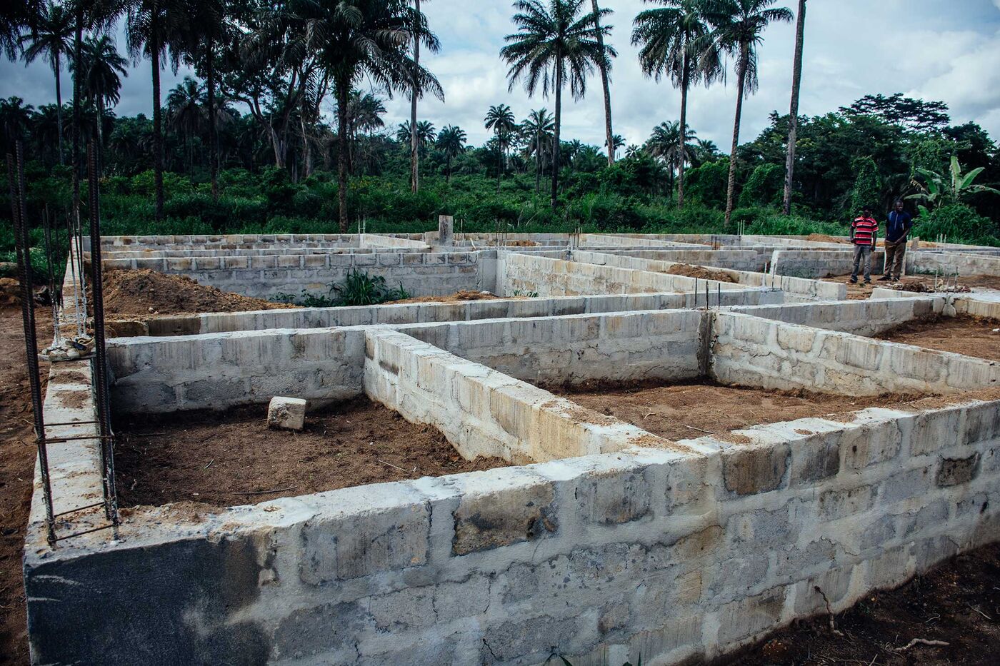 Pastor Momoh visits an ongoing project, a proposed site for a school in the Koryadu community.