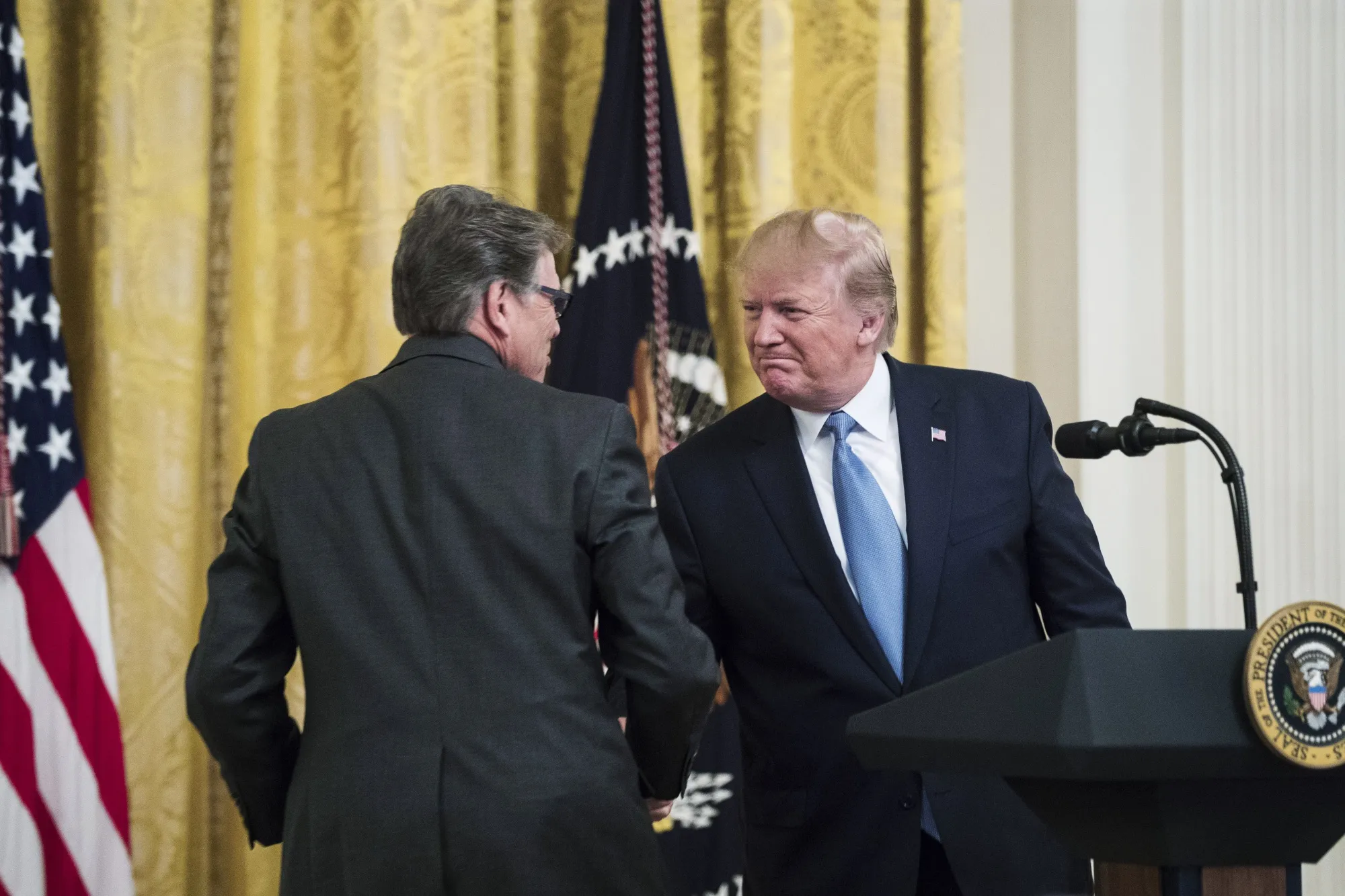 Donald Trump and Rick Perry.&nbsp;